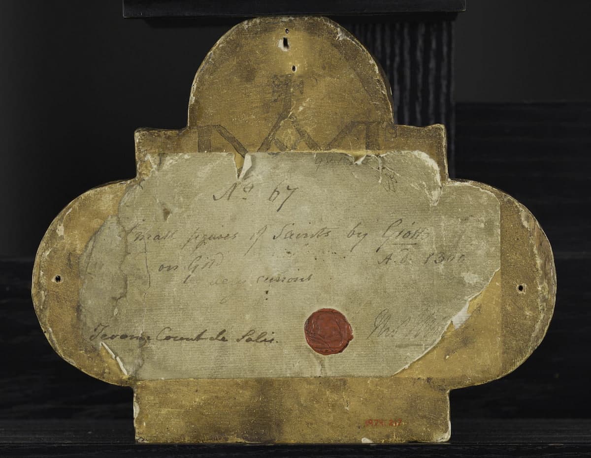 《聖人とともに玉座に座るキリスト》のパネル裏面（メモや封蝋が残る例）